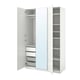 Option: A white PAX wardrobe. It has open doors revealing shelves and drawers.