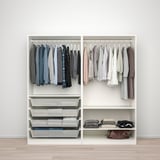A white wardrobe with two sections: hanging clothes on rods and folded clothes in baskets, showing efficient organization.