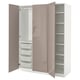 A PAX wardrobe in white with pink doors. It has three sections: two with drawers and one with shelves. Dampers for soft closing.