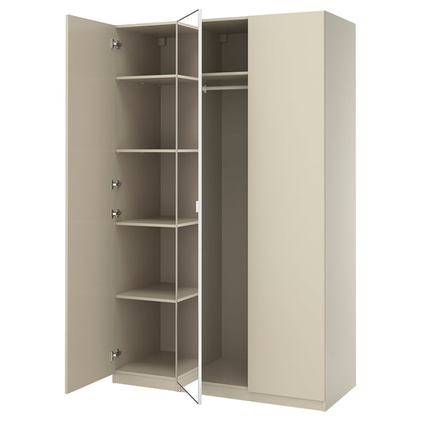 An open beige PAX wardrobe with adjustable shelves and a hanging rail.
