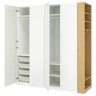 Three open wardrobes: two white PAX with drawers and shelves, one light wood PAX with shelves.