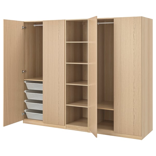 Wooden three-door PAX wardrobe with shelves and baskets.