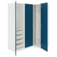 An open blue and white ikea PAX wardrobe. It has shelves, mesh baskets, and drawers for storage.