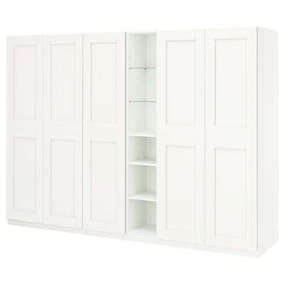White PAX wardrobe with adjustable shelves and soft-closing doors.