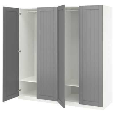 Gray PAX wardrobe with open doors, showing storage shelves.