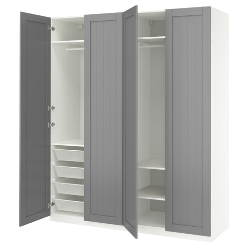 Displays a PAX wardrobe in grey with various organizational. The wardrobe includes shelves and wire baskets for storage.