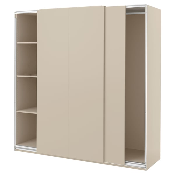 Beige PAX wardrobe with sliding doors, sleek modern look, three sections.