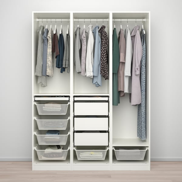 White PAX wardrobe hanging clothes, mesh baskets, and drawers, with an airy design for efficient storage.