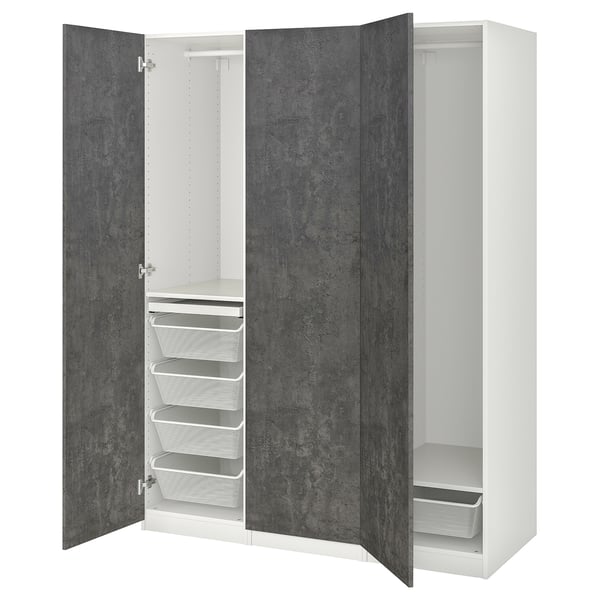 An open white PAX wardrobe with drawers, shelves, and hanging space.