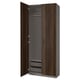 Open PAX wardrobe: dark wood, grey shelves, asymmetrical doors with soft-close hinges.