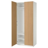 An ikea PAX wardrobe with a light brown door, featuring a white interior with shelves and a clothes rail.