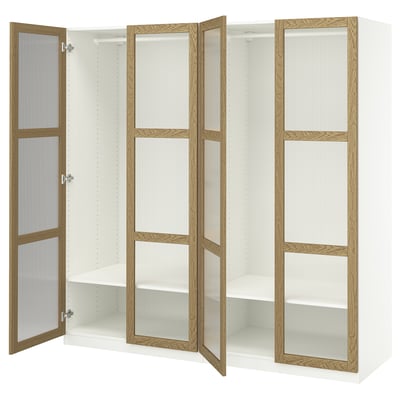 PAX wardrobe, white with oak doors, open, shows interior shelves.