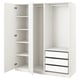 A white ikea PAX wardrobe set with open doors revealing shelves and drawers.