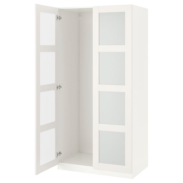 A white PAX wardrobe with mirrored doors and adjustable feet for stability.