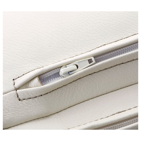 Close-up of POÄNG armchair cushion zipper, showcasing high-quality leather and sturdy stitching.