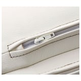 Close-up of POÄNG armchair cushion zipper, showcasing high-quality leather and sturdy stitching.