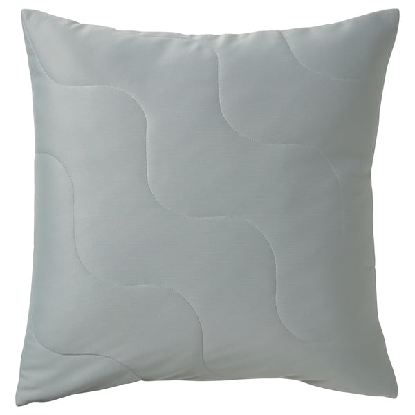 Light grey turquoise square throw pillow with wave pattern and quilted texture.