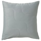 Light grey turquoise square throw pillow with wave pattern and quilted texture.