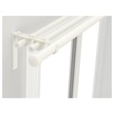 White curtain rod holder system with 3 holders and corner brackets. Flexible design.