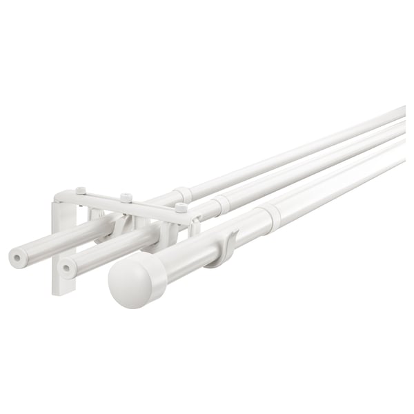 White racka curtain rod system. Triple bar setup, holds multiple layers of curtains. Adjustable, modern design with round finials.