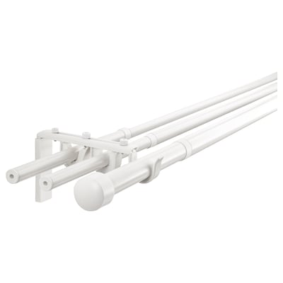 White racka curtain rod system. Triple bar setup, holds multiple layers of curtains. Adjustable, modern design with round finials.