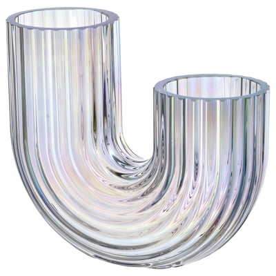 The RÄFFELBJÖRK vase, a clear glass sculpture with a flowing, rainbow-inspired, grooved design.