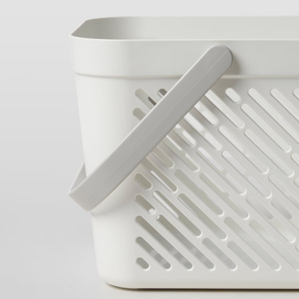 White plastic storage basket with holes, foldable handle for easy carrying, perfect for bathroom or kitchen.