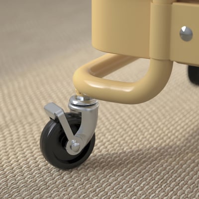 Close-up of a trolleys lockable caster, showcasing sturdy steel and smooth black wheel, ensuring stability and easy movement.