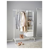 RIGGA clothes rack with adjustable shelves and hanging bar, holding various items.