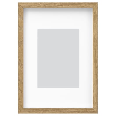 Wooden RÖDALM photo frame, light brown. Modern design, versatile use, includes mount.