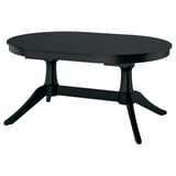 Black ROSENTORP extendable dining table, oval, fits 6-8 seats.