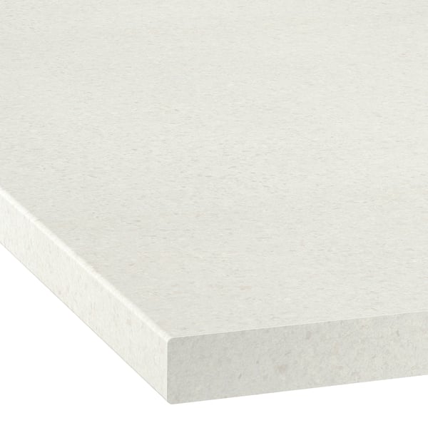 Close-up of sleek, light grey SÄLJAN worktop with rounded edge, showcasing high-quality finish and smooth texture.