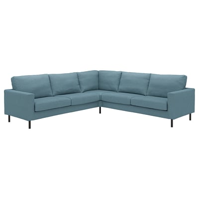 A blue SALTSJÖBADEN sectional sofa, featuring a modern design with comfortable cushions and solid legs.