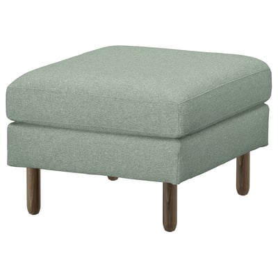 An IKEA SALTSJÖBADEN light green, square-shaped footstool. Its clean design includes a fabric-covered cushion atop solid wooden legs for support.