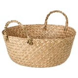 Handwoven basket named SANDJORD in natural sedge color, featuring a circular shape with two twisted handles for carrying. A rustic, natural design.