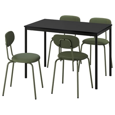 A sandberg dining set with a black table and four green chairs. The chairs have metal frames, padded seats, and backs, with a modern, sleek design.