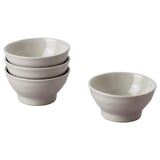 Four light grey ceramic bowls, three stacked, one aside. Rustic, handmade design.