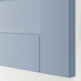 Close-up of high-quality, blue cabinet door. Smooth, uniform finish with clean edges. Shows fine craftsmanship, part of SANNIDAL collection.