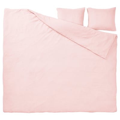 Light pink bed set, organic cotton, smooth with subtle texture, includes duvet and two pillows.
