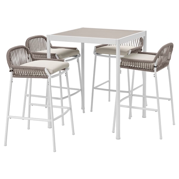 Modern white outdoor bar set with wicker stools.