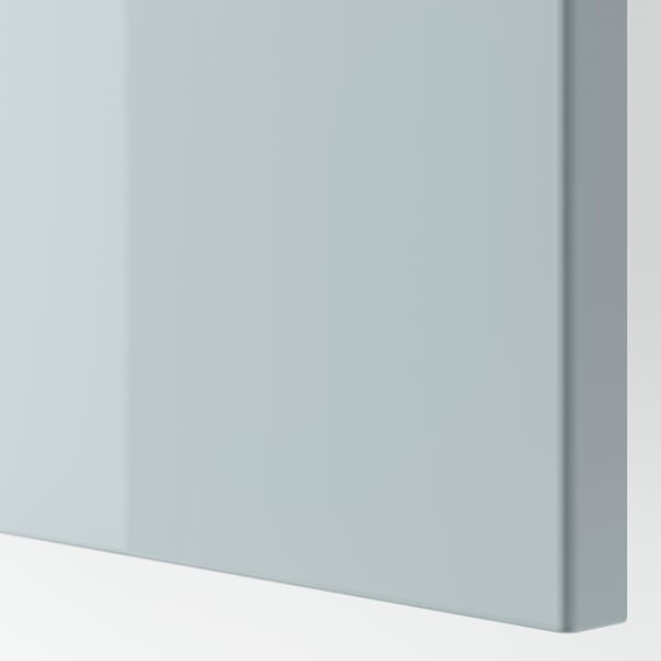 Smooth, sleek surface of modern drawer front in grey-blue, showcasing high-quality finish and clean design.