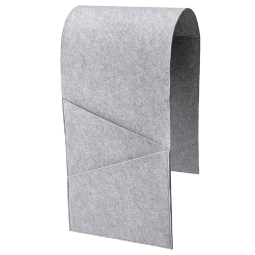A grey SILÄNG storage pocket with geometric design, made of polyester and felt, for organising items near sofas or chairs.