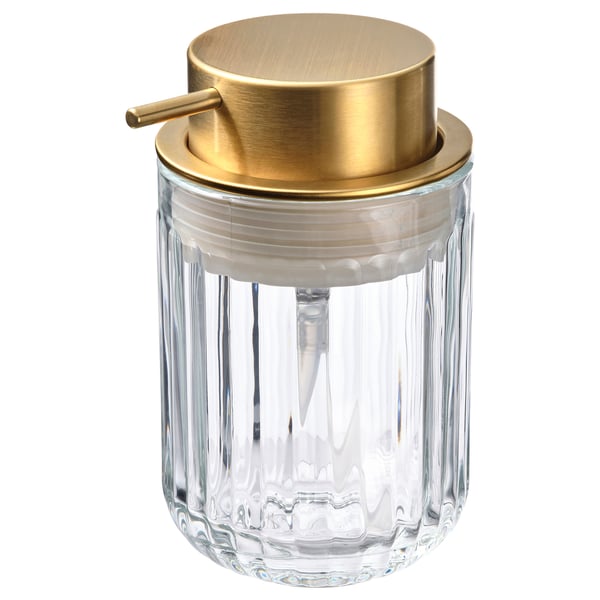 A SILVTJÄRN soap dispenser with a gold-colored brass pump, clear glass body, and modern design.