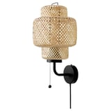 SINNERLIG wall lamp: natural woven bamboo in warm, soft shape with pull chain.