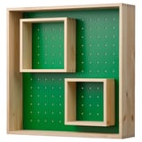 A SKOGSMOSAIK shelf with a green back and wooden frame, featuring moveable inner shelves for versatile storage.