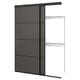 Option: The SKYTTA modern black sliding door with sleek metal frame and dark panels.
