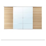 This image shows a SKYTTA closet with light wood and frosted glass doors.