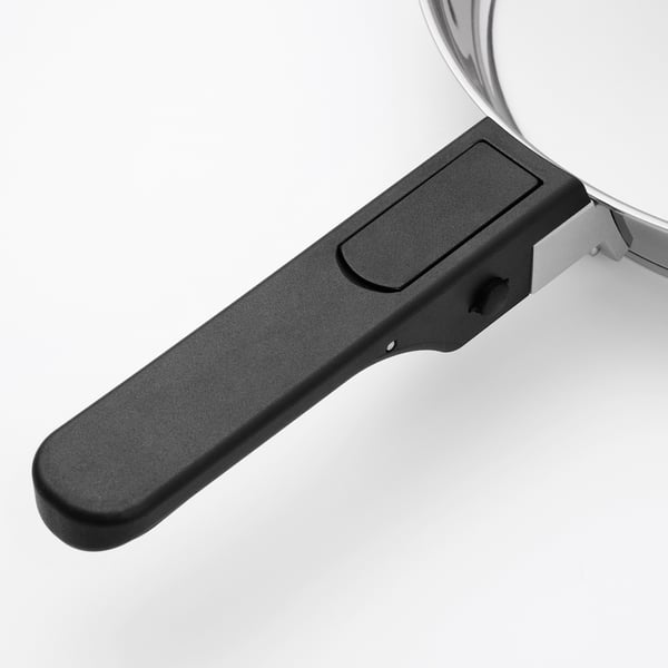 Durable pan handle, securely fastened, ready for safe and efficient cooking.