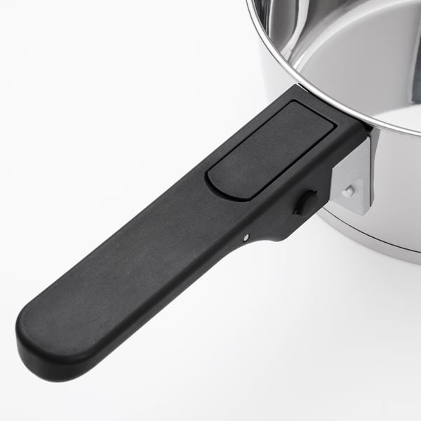 Modern saucepan with sturdy, removable handle. Black, sleek design. High-quality stainless steel.