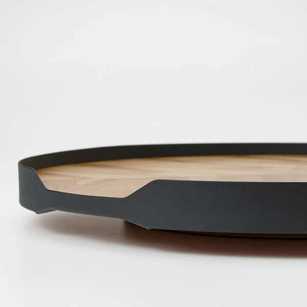 A high-quality, round wooden tray with a stylish metal frame. The tray has a smooth, light wooden surface and sturdy edges for easy carrying.